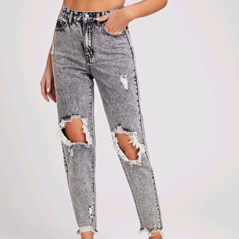 High waisted ripped raw hem jeans
